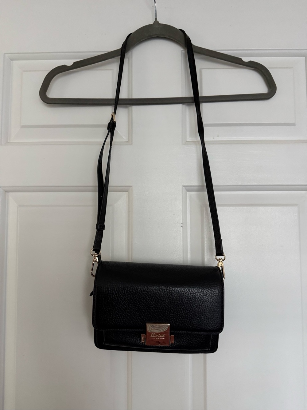 Classic Black Pebbled Leather Crossbody with Gold-Tone Clasp